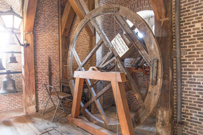 Chairs and table against wall in building
