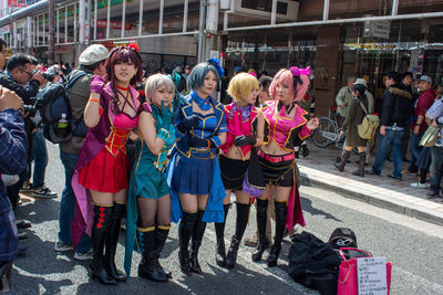 Group of people standing on street