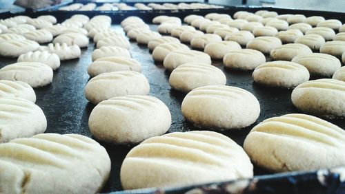 Close-up of raw cookie dough in baking sheet