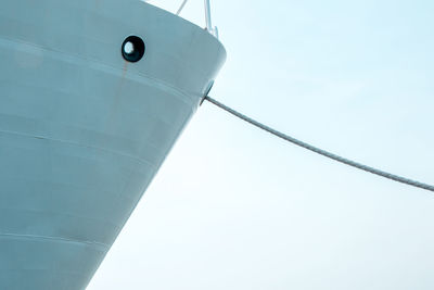 Low angle view of sailboat in sea against sky