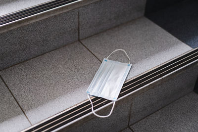 High angle view of computer keyboard on tiled floor