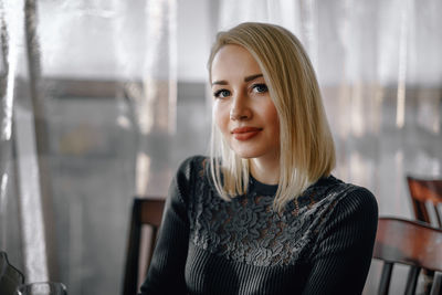 Portrait of smiling young woman
