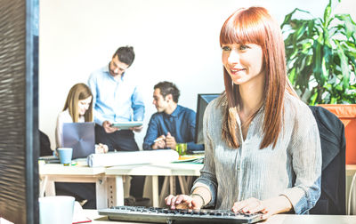 Group of people working on table