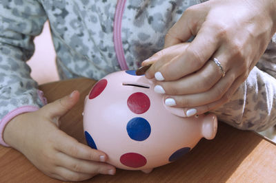 Close-up of woman holding hands