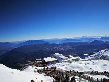 High angle view of snowcapped mountains against clear blue sky
jade dragon snow mountain