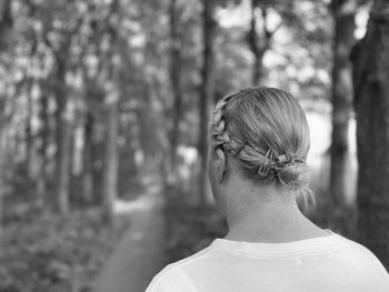 Rear view of woman with braided hair