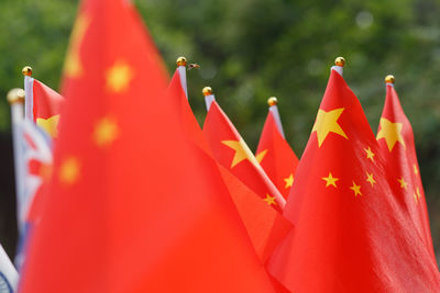 Close-up of chinese flags