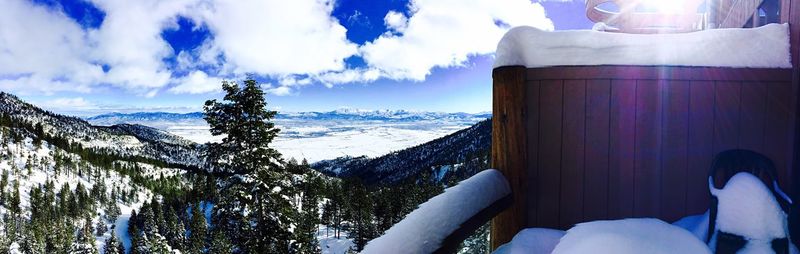 Scenic view of snow covered mountains