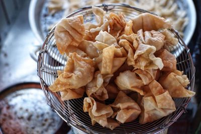 High angle view of bread in basket on table