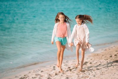 Full length of women on beach