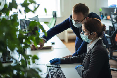 Business colleagues working at office