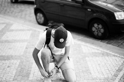 High angle view of child on street in city