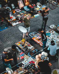 High angle view of people at market stall in city