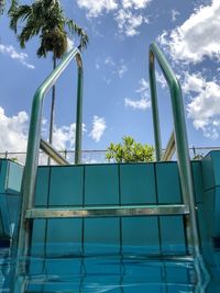 Low angle view of swimming pool against sky