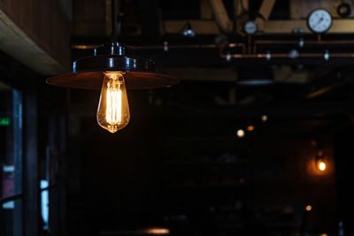 Close-up of illuminated light bulb