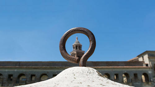 Low angle view of historical building against clear blue sky