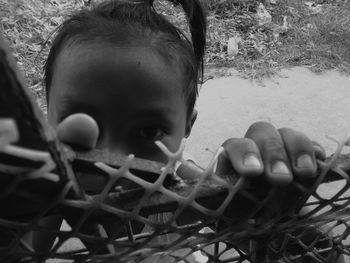 Close-up portrait of cute boy outdoors