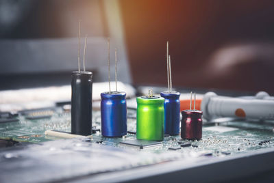 Close-up of multi colored pencils on table