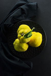 Raw quinces on