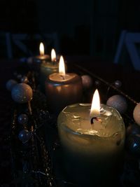 Close-up of burning candles