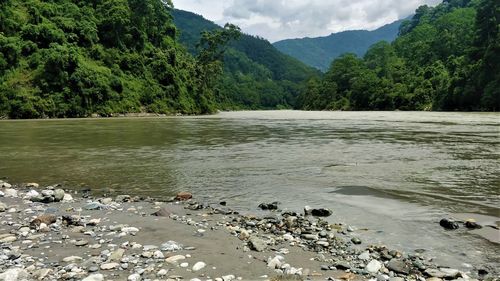 Scenic view of river against sky