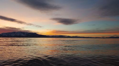 Scenic view of sea against sky during sunset