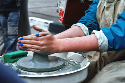 Close-up of hands working