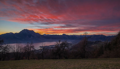 Scenic view of landscape against sky during sunset