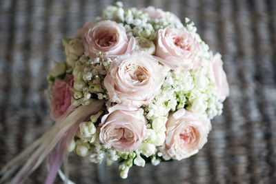 Close-up of rose bouquet during wedding