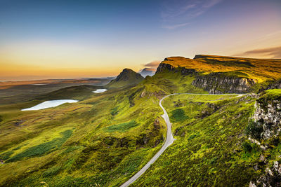 Scenic view of landscape against sky during sunset