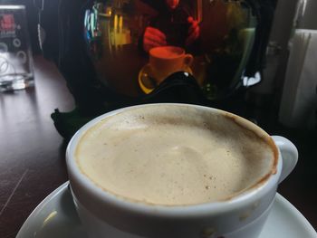 Close-up of cappuccino on table