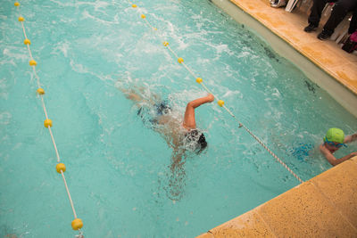 Child swimming race