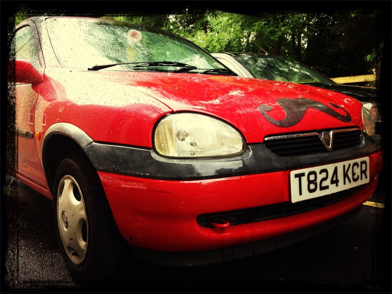 red, transportation, mode of transport, transfer print, land vehicle, car, auto post production filter, close-up, no people, day, metal, outdoors, stationary, part of, parking, wheel, old-fashioned, reflection, travel, safety