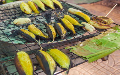 High angle view of fruits on barbecue grill