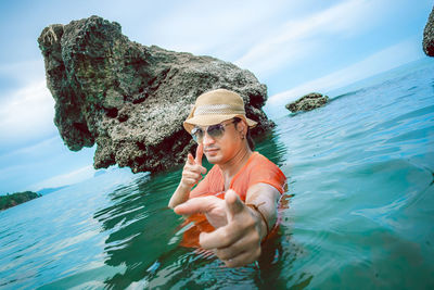 Woman swimming in sea