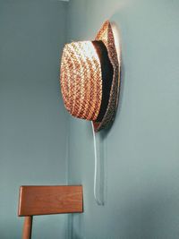 Hat hanging on wall at home