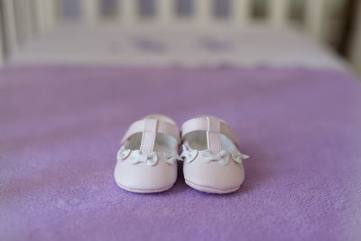 Close-up of shoes on table