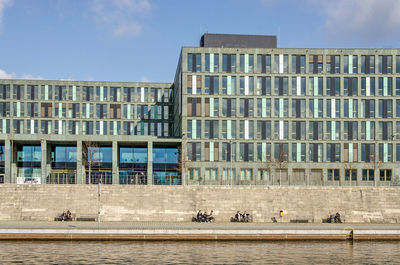 Bank of the river spree with government buildings as backdrop