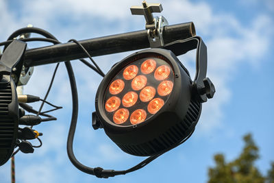 Low angle view of illuminated light against sky