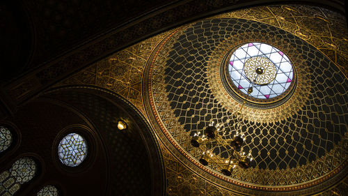 Low angle view of illuminated ceiling of building