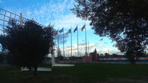 Low angle view of flag against sky