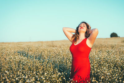 Woman standing in a field