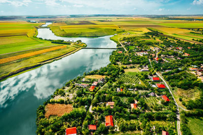 Aerial view of village by the lake in summer