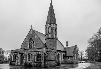 View of temple against building