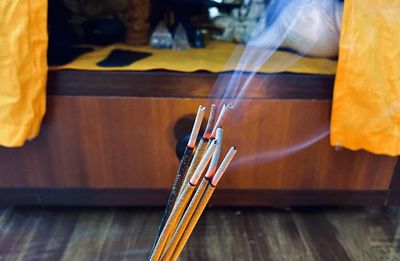 Close-up of paintbrushes on table