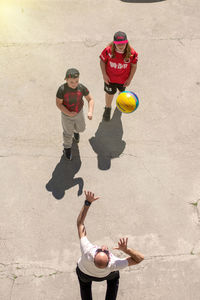 High angle view of friends standing outdoors