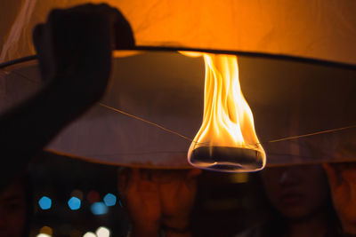 Close-up of illuminated light bulb