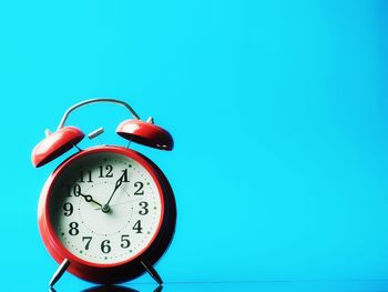 Close-up of clock on wall