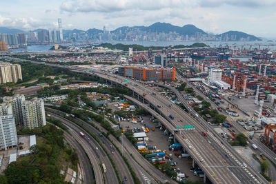 High angle view of street amidst buildings in city