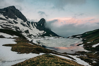 Landscape picture of rappensee with snow during sunrise 